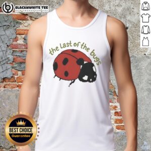 Hot indie folk concert featuring 'The Last of Bugs' wearing a stylish tank top, capturing an energetic live music vibe.