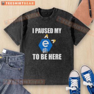 Alt Text: Good I Paused My E621 To Be Here logo on a washed t-shirt, perfect for fans of furry art and memes.