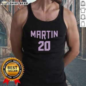Alt Text: Awesome Kate Martin wearing a Golden State Valkyries tank top, showcasing team spirit and stylish athletic wear.
