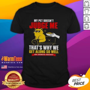 Official Orange Cat My Pet Doesn'T Judge Me T-Shirt featuring a playful orange cat design, perfect for cat lovers.