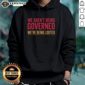 Nice We Aren't Being Governed We're Being Looted Hoodie displayed on a mannequin, showcasing its bold message.