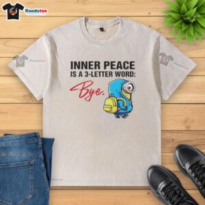 Official Minion Inner Peace Is A 3 Letter Word Bye Washed T-Shirt featuring a playful Minion graphic in vibrant colors.