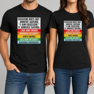 Original Fascism Does Not Arrive Saying I Am Fascism It Arrives Saying Law And Order graphic t shirt in black, front view