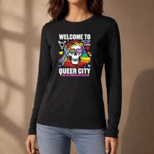 Original Welcome To Queer City Dont Fear The Gay Reaper We Put Pronouns In The Water long sleeve shirt in black with colorful text design