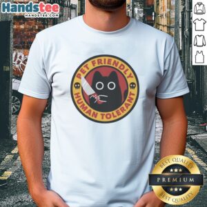 Official Pet Friendly Human Tolerant Black Cat With Knife Funny Parody Art Cotton Shirt displayed on a hanger