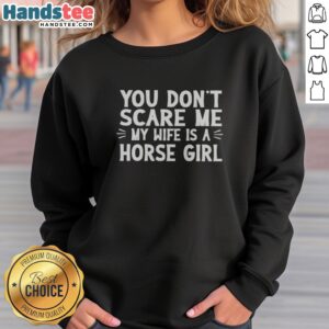 Funny You Dont Scare Me My Wife Is A Horse Girl sweatshirt displayed on a hanger