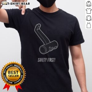 Pretty Safety First Shirt displayed on a flat surface, showcasing its vibrant design and comfortable fabric.