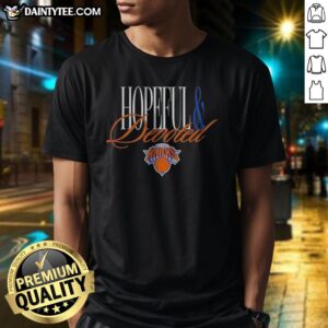 Funny New York Knicks Hopeful And Devoted Legacy Shirt displayed on a hanger with vibrant colors.