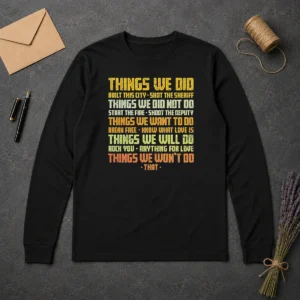 Pretty Things We Did Built This City Long Sleeve Shirt in dark color with bold city graphic