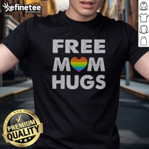 Official Free Mom Hugs Rainbow Heart Pride Movement Inclusive Love And Support t shirt displayed on a neutral background