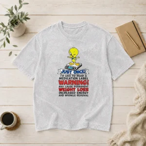 Original Tweety Bird Just Once I'D Like To Read A Medication Label Warning printed on a soft washed t shirt in light yellow