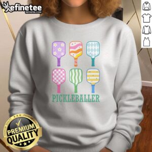 Official Pickleballer Pickle Baller Funny Cute Pickleball sweatshirt displayed in a cozy setting