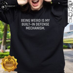 Nice Being Weird Is My Built In Defense Mechanism Built In Weirdness Sweatshirt in a cozy setting.