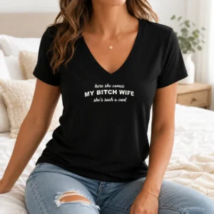 Hot Joe Giudice Here She Comes My Bitch Wife Shes Such A Cunt V Neck Shirt in black with white text on a soft fabric