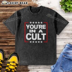 Top You're In A Cult satirical political statement stars washed t-shirt, featuring bold graphics and a unique design.