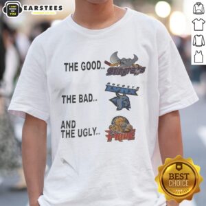 Official The Good The Bad And The Ugly shirt displayed on a flat lay with a vintage backdrop