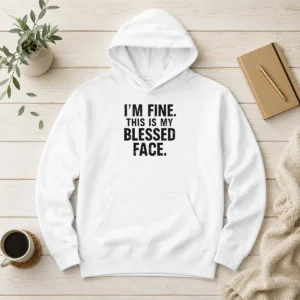 Good I'M Fine This Is My Blessed Face Hoodie in black with front pouch pocket and drawstring hood