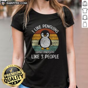 Premium I Like Penguins And Maybe Like 3 People Ladies Shirt displayed on a hanger with a soft background.