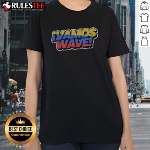 Top Colombia Vamos Wave Ladies Shirt displayed on a wooden surface