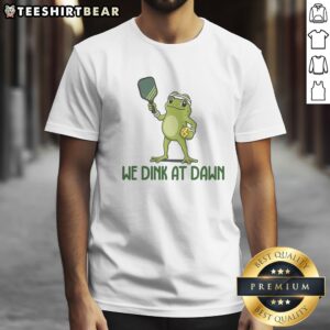 Premium We Dink At Dawn Pickle Ball Shirt featuring a playful design for pickleball enthusiasts.