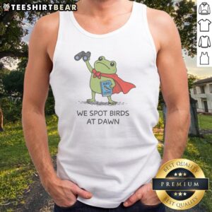 Premium We Spot Birds At Dawn Tank top displayed on a wooden background, perfect for nature lovers.