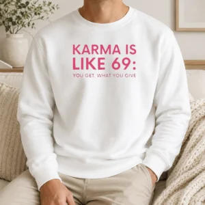 Premium Karma Is Like 69 You Get What You Give Sweater in dark gray, featuring bold white text on front