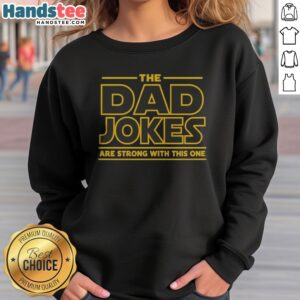 Awesome The Dad Jokes Are Strong With The One sweatshirt featuring a playful design for dads.