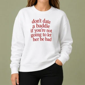 Top Dont Date A Baddie If Youre Not Going To Let Her Be Bad sweater in black, crewneck style with bold white text