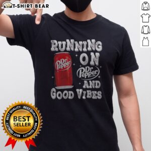 Pretty Running On Dr Pepper And Good Vibes Shirt displayed on a neutral background, showcasing vibrant colors and fun graphics.