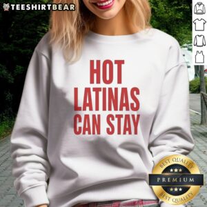 Good Trump Hot Latinas Can Stay Sweatshirt displayed in a cozy setting, perfect for casual wear.