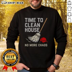 Nice Time To Clean House No More Chaos Sweatshirt displayed on a hanger with a cozy background.