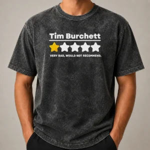 Pretty Tim Burchett 1 Star Very Bad Would Not Recommend printed on a soft washed t shirt in light gray