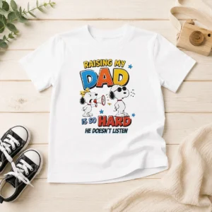 Premium Snoopy Belle Peanuts Raising My Dad Is So Hard He Does Not Listen kids t shirt in white, featuring a playful graphic design