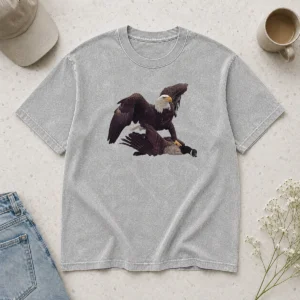 Top Bald Eagle Attacking Canada Goose Washed T Shirt in soft cotton fabric with a faded vintage look