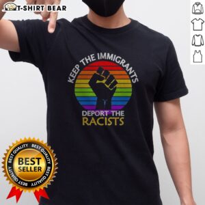 Good Keep Immigrants Deport Racists Raised Fist Rainbow Flag Solidarity Shirt displayed on a hanger