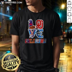 Hot Oklahoma Sooners Oklahoma State Cowboys OKC Thunder Tulsa Golden Hurricane Love Oklahoma Teams Sport Shirt displayed on a hanger