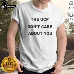 Original The Ucp Don'T Care About You Black Text Shirt displayed on a wooden background
