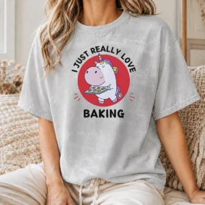 Funny Unicorn Holding Baking Tray I Just Really Love Baking printed on a washed t shirt in soft cotton fabric