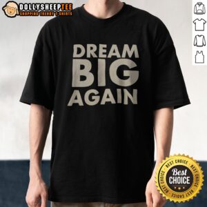 Top Dream Big Again Shirt displayed on a flat surface with vibrant colors and a modern design.