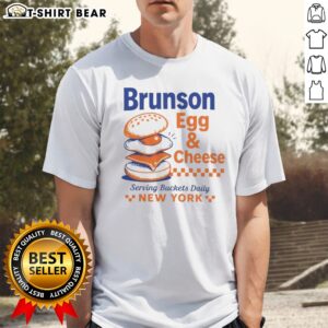 Official Brunson Egg & Cheese Serving Buckets Daily NEW YORK Jalen Brunson Shirt in white, short sleeve crew neck tee
