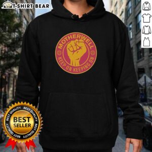Official Motherwell FC 'Keep On Keeping On' hoodie featuring a raised fist design, perfect for fans and casual wear.