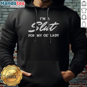 Original I'M A Slut For My Ol' Lady Hoodie displayed on a hanger with a cozy background