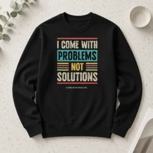 Official I Come With Problems Not Solutions long sleeve shirt in black with white text design, front view