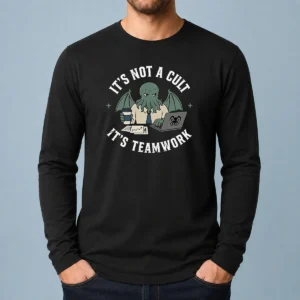 Premium It'S Not A Cult It'S Teamwork long sleeve shirt with bold text design on front, displayed on white background