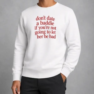 Pretty Dont Date A Baddie If Youre Not Going To Let Her Be Bad Sweater in black, cozy crewneck sweatshirt with bold white lettering