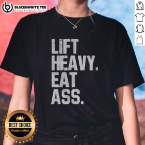 Hot Lift Heavy Eat Ass Ladies Shirt featuring bold text and a comfortable fit for active women.