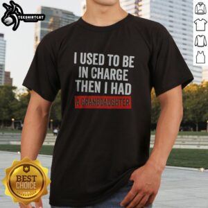 Hot I Used To Be In Charge Then I Had A Granddaughter Shirt displayed on a hanger
