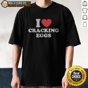 Good I Love Cracking Eggs Heart Shape Shirt displayed on a hanger with a vibrant background