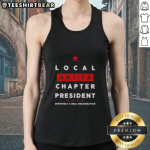 Hot Local Antifa Chapter President wearing a tank top at a rally, promoting activism and community engagement.