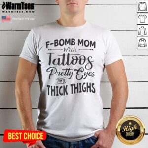 Funny F Bomb Mom With Tattoos Pretty Eyes And Thick Thighs shirt featuring bold graphic text on a comfortable short sleeve tee